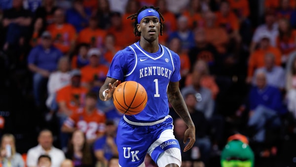 Feb 14, 2026; Gainesville, Florida, USA; Kentucky Wildcats guard Denzel Aberdeen (1) dribbles the ball against the Florida Gators during the first half at Exactech Arena at the Stephen C. O'Connell Center. Mandatory Credit: Matt Pendleton-Imagn Images