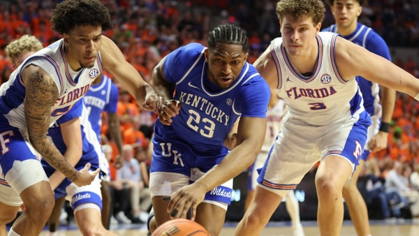 Florida guard Isaiah Brown (20), left, and Florida center Micah Handlogten (3) fight Kentucky forward Mouhamed Dioubate (23) for the rebound during the first half of a NCAA mens basketball game at Steven C. O'Connell Center Exactek arena in Gainesville, FL on Saturday, February 14, 2026. [Alan Youngblood/Gainesville Sun]