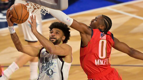 Feb 15, 2026; Inglewood, California, USA; Team World guard Jamal Murray (27) of the Denver Nuggets shoots against Team USA Stars guard Tyrese Maxey (0) of the Philadelphia 76ers in game one during the 75th NBA All Star Game at Intuit Dome. Mandatory Credit: Jayne Kamin-Oncea-Imagn Images