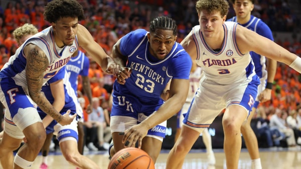 Florida guard Isaiah Brown (20), left, and Florida center Micah Handlogten (3) fight Kentucky forward Mouhamed Dioubate (23) for the rebound during the first half on Saturday, February 14, 2026., in Gainesville. (Alan Youngblood/imagn Photos)