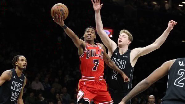 Feb 9, 2026; Brooklyn, New York, USA; Chicago Bulls guard Rob Dillingham (7) goes to the basket against Brooklyn Nets forward Danny Wolf (2) during the first half at Barclays Center. Mandatory Credit: Vincent Carchietta-Imagn Images