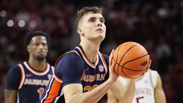 Feb 14, 2026; Fayetteville, Arkansas, USA; Auburn Tigers forward Filip Jovic (38) shoots a free throw in the second half against the Arkansas Razorbacks at Bud Walton Arena. Mandatory Credit: Nelson Chenault-Imagn Images