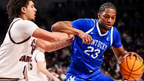 Feb 24, 2026; Columbia, South Carolina, USA; Kentucky Wildcats forward Mouhamed Dioubate (23) attempts to drives around South Carolina Gamecocks forward EJ Walker (6) during the second half at Colonial Life Arena. Mandatory Credit: Jeff Blake-Imagn Images