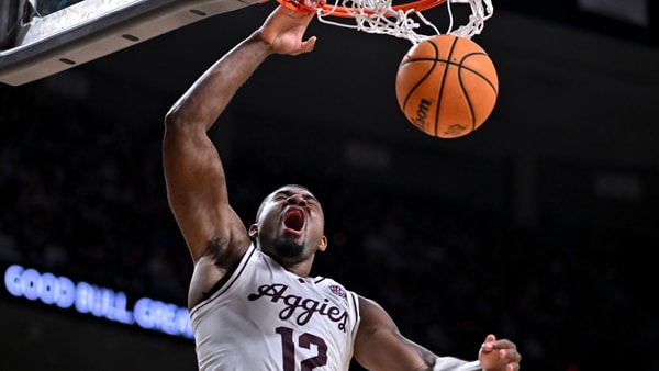 Reshaun Agee dunks one home for Texas A&M, via Maria Lysaker-Imagn Images