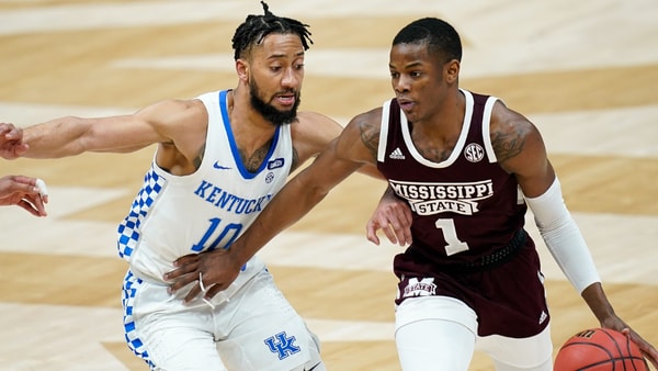 Mississippi State guard Iverson Molinar (1) battles with Kentucky guard Davion Mintz (10) during the second half of the SEC Men's Basketball Tournament game at Bridgestone Arena in Nashville, Tenn., Thursday, March 11, 2021. (© Andrew Nelles / Tennessean.com via Imagn Content Services, LLC)