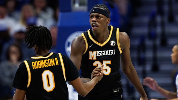 Jan 7, 2026; Lexington, Kentucky, USA; Missouri Tigers forward Mark Mitchell (25) celebrates with guard Anthony Robinson II (0) during the second half against the Kentucky Wildcats at Rupp Arena at Central Bank Center. Mandatory Credit: Jordan Prather-Imagn Images