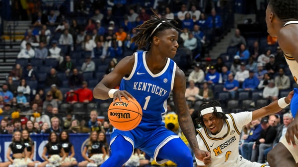 Mar 12, 2026; Nashville, TN, USA; Kentucky Wildcats guard Denzel Aberdeen (1) dribbles the ball past Missouri Tigers guard Anthony Robinson II (0) during the second half at Bridgestone Arena. Mandatory Credit: Steve Roberts-Imagn