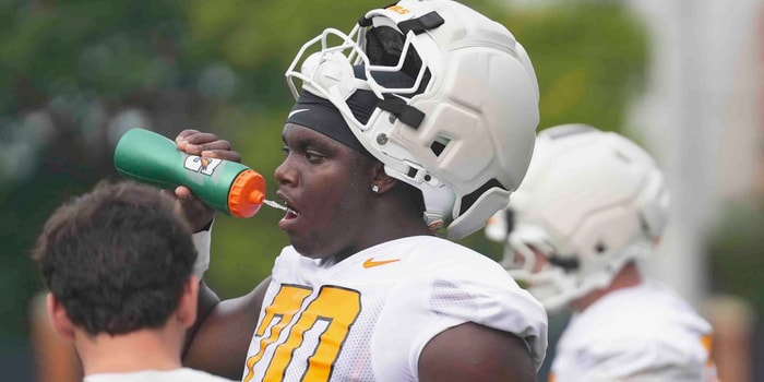 Caitie McMekin/News Sentinel / USA TODAY NETWORK via Imagn Images  | Tennessee offensive lineman David Sanders Jr. (70) drinks water during Tennessee football preseason practice, in Knoxville, Tennessee, July 31, 2025.