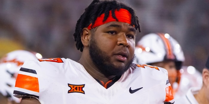 Sep 9, 2023; Tempe, Arizona, USA; Oklahoma State Cowboys offensive lineman Noah McKinney (77) against the Arizona State Sun Devils at Mountain America Stadium. Mandatory Credit: Mark J. Rebilas-Imagn Images