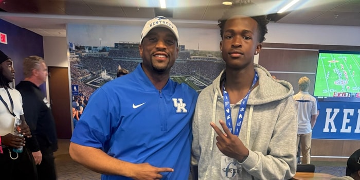 Dre Otey with Kentucky defensive backs coach Chris Collins (Photo provided by Dre Otey)