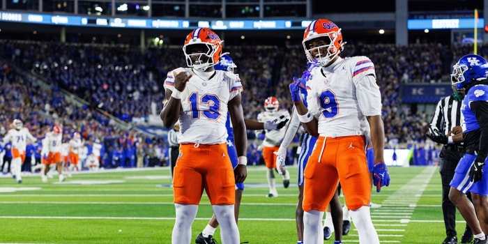 Nov 8, 2025; Lexington, Kentucky, USA; Florida Gators running back Jadan Baugh (13) celebrates with wide receiver J. Michael Sturdivant (9) after scoring a touchdown during the first quarter against the Kentucky Wildcats at Kroger Field. Mandatory Credit: Jordan Prather-Imagn Images