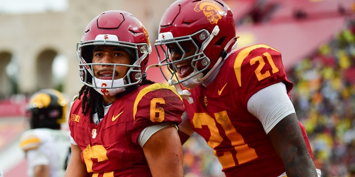 USC Trojans wide receiver Makai Lemon (6) celebrates his touchdown scored against the Iowa Hawkeyes with running back Bryan Jackson (21) during the second half at the Los Angeles Memorial Coliseum