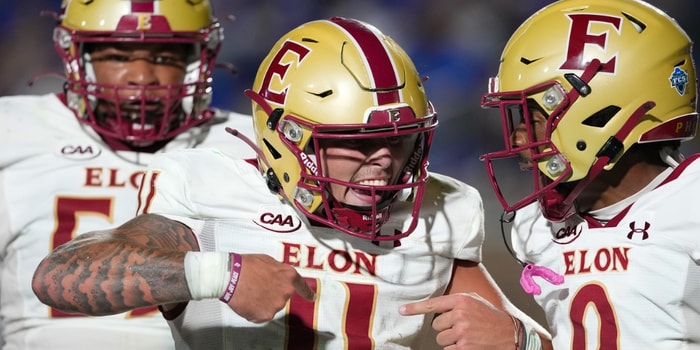 Aug 28, 2025; Durham, North Carolina, USA; Elon Phoenix quarterback Landen Clark (11) celebrates his touchdown run with wide receiver Kenaz McMillian (9) against the Duke Blue Devils during the first half at Wallace Wade Stadium. Mandatory Credit: James Guillory-Imagn Images