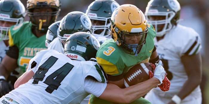 Trinity's Nick Lococo (44) tackles Bryan Station's Jordan Haskins (3) during their game on Friday, Aug. 23, 2024 at Bryan Station High School in Lexington, Ky. © Clare Grant/Courier Journal / USA TODAY NETWORK