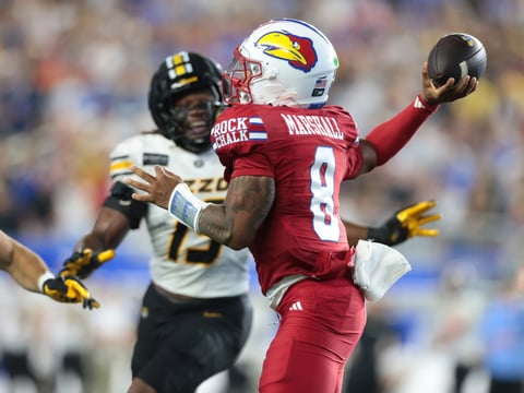 Kansas Jayhawks quarterback Isaiah Marshall (8) throws the ball against Missouri Tigers during the game inside David Booth