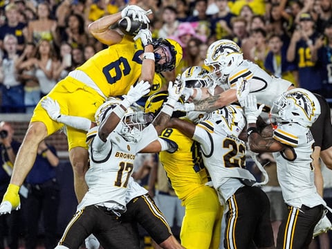 Michigan wide receiver JJ Buchanan (6) catches a 47-yard touchdown on a Hail Mary against Western Michigan to win, 13-12, as time expires in the fourth quarter at Michigan Stadium in Ann Arbor on Saturday, Sept. 5, 2026.