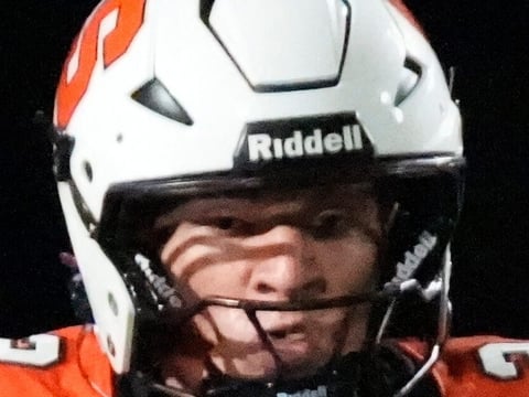 Sarasota High quarterback Hudson West (#2) has to scramble as the pocket collapses. The Sarasota High School Sailors hosted the