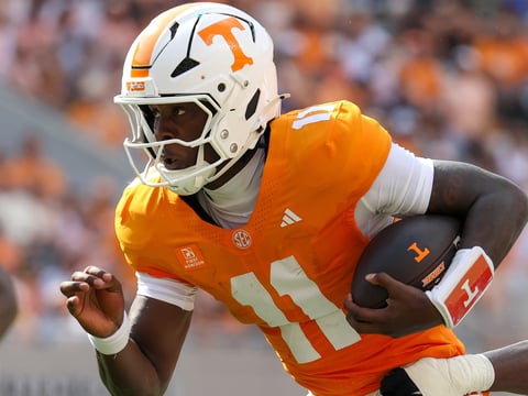 Sep 5, 2026; Knoxville, Tennessee, USA; Tennessee Volunteers quarterback Faizon Brandon (11) runs the ball against the Furman Paladins during the first half at Neyland Stadium. Mandatory Credit: Randy Sartin-Imagn Images