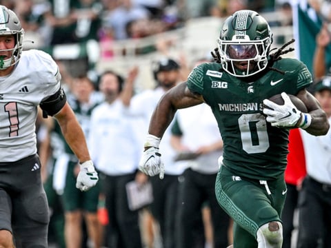 Michigan State’s Cam Edwards runs for a gain against Eastern Michigan during the fourth quarter on Saturday, Sept. 12, 2026, at Spartan Stadium in East Lansing. - Nick King, USA TODAY Sports