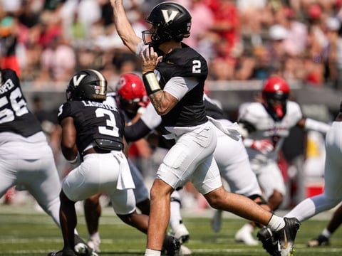 Vanderbilt quarterback Jared Curtis (2) throws a pass against NC State during the third quarter at FirstBank Stadium in