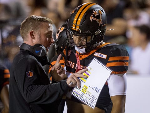 UTEPs head football coach Scotty Walden talks to Jaime Guerrero during the football home opener against Texas Southern on