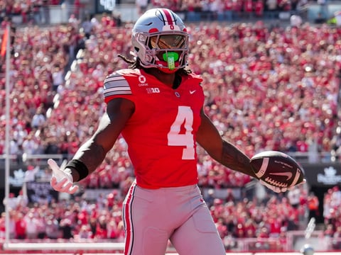 2026-09-26T184543Z_1608629237_MT1USATODAY29922534_RTRMADP_3_OHIO-STATE-BUCKEYES-WIDE-RECEIVER-JEREMIAH-SMITH-4-SCORES