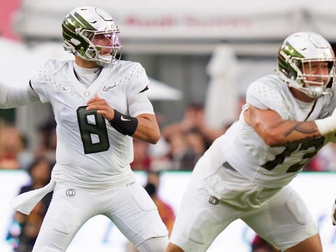 Oregon quarterback Dylan Raiola throws a pass as the Oregon Ducks face the USC Trojans on Sept. 26, 2026, at Los Angeles
