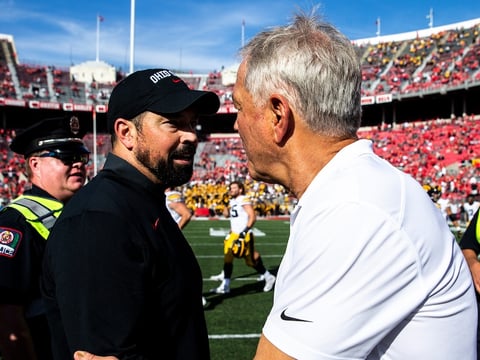 Ohio State head coach Ryan Day, left, shakes hands with Iowa head coach Kirk Ferentz after a NCAA football game, Saturday, Oct.
