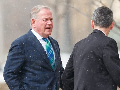 2026-03-16T201359Z_1266297718_MT1USATODAY28515798_RTRMADP_3_BRIAN-KELLY-LEFT-ARRIVES-AT-THE-FUNERAL-SERVICE-FOR-FORMER (1)
