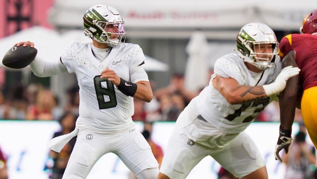 Oregon quarterback Dylan Raiola throws a pass as the Oregon Ducks face the USC Trojans on Sept. 26, 2026, at Los Angeles