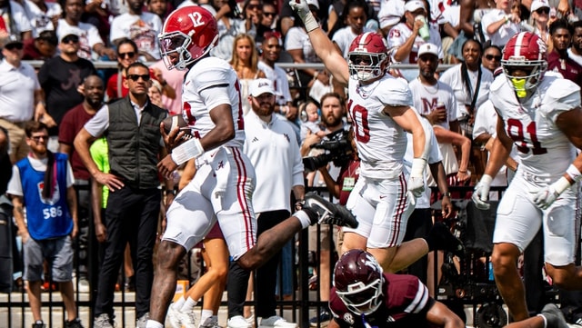 Alabama quarterback Keelon Russell (12) carries the ball for a touchdown during a college football game between Mississippi