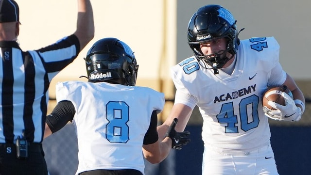 NFL Academy's Leon Donato (8) and Silas Fløche (40) celebrate a touchdown at Hoban, Aug. 28, 2026.