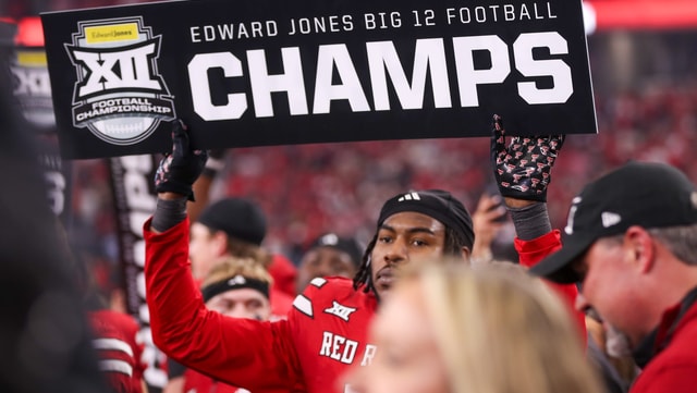 Texas Tech's Charles Esters III holds a sign after the Big 12 Conference championship football game, Saturday, Nov. 6, 2025, at