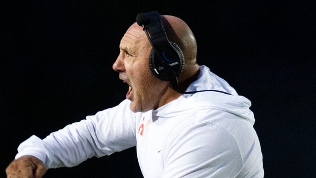 Heritage head football coach Joe Osovet yells during a football game at Heritage high school on Thursday, Oct. 19, 2023.