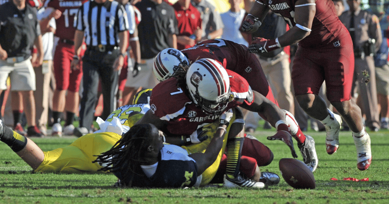 South Carolina football legend Jadeveon Clowney's "The Hit" vs. Michigan. Photo credit: Al Messerschmidt/Getty Images