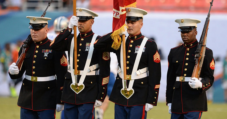 Dallas Cowboys Add Red Stripe To Helmets To Honor Military, Medal