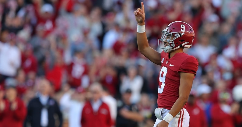 DeVonta Smith congratulates Alabama's Bryce Young for Heisman