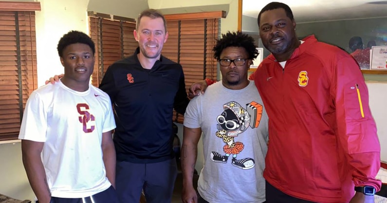 Raleek Brown with Lincoln Riley