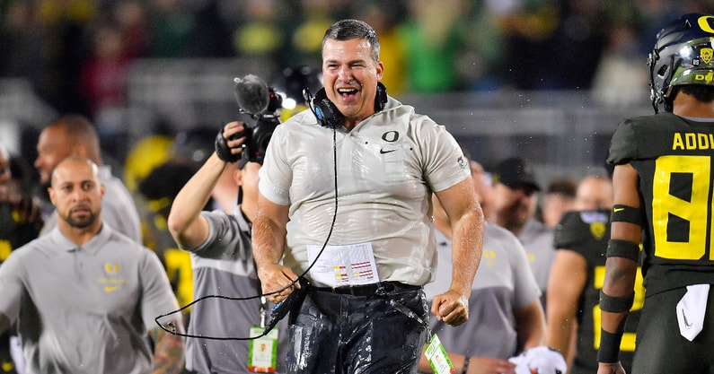 mario-cristobal-officially-announced-as-miami-hurricanes-head-football-coach-manny-diaz-oregon-ducks-president-julio-frenk-coaching-carousel