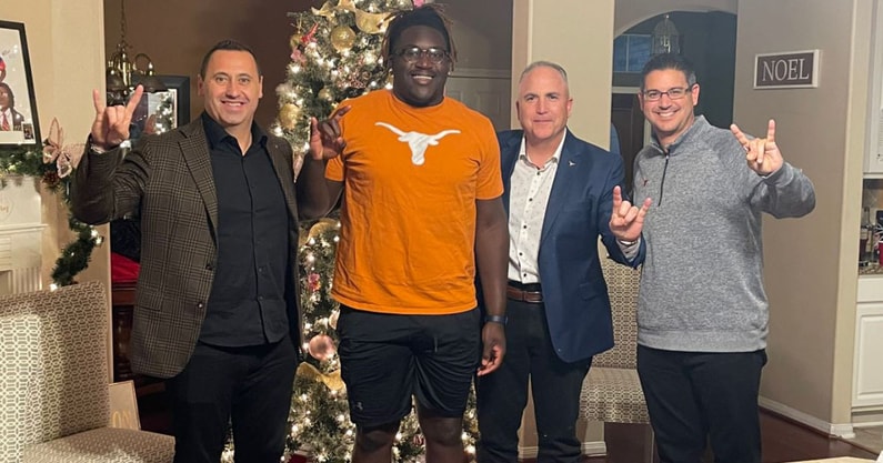 Kam Dewberrry with Texas coaches