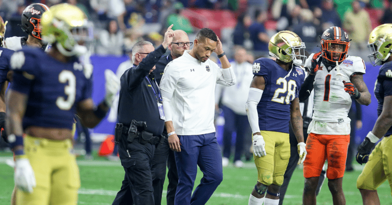 Marcus Freeman reacts to Notre Dame's loss to Oklahoma State in the fiesta Bowl. 