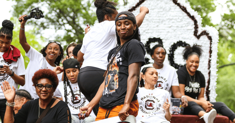 Former South Carolina guard Khadijah Sessions dances down Main Street during the national championship parade on Wednesday (Photo: Katie Dugan)