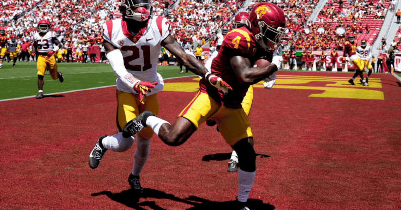 Los Angeles, CA - April 23: Mario Williams #4 of the USC Trojans catches a pass over Latrell McCutchin #21 of the USC Trojans for a touchdown during the Spring football game at the Los Angeles Memorial Coliseum in Los Angeles on Saturday, April 23, 2022. 
