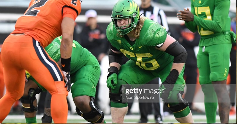 EUGENE, OR - NOVEMBER 27: Oregon Ducks OL T.J. Bass (56) lines up during a PAC-12 conference football game between the Oregon State Beavers and Oregon Ducks on November 27, 2021 at Autzen Stadium in Eugene, Oregon. (Photo by Brian Murphy/Icon Sportswire v