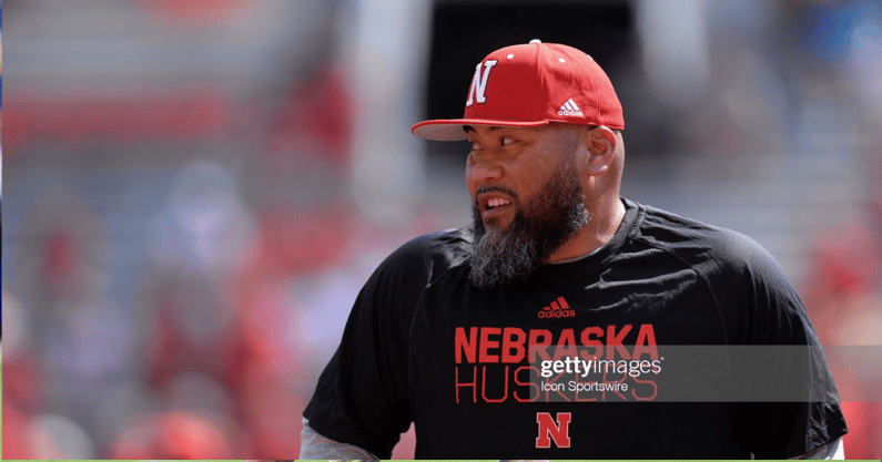 CHAMPAIGN, IL - AUGUST 28: Nebraska Cornhuskers defensive line coach Tony Tuioti looks on as players warm up for the Big Ten Conference college football game between the Nebraska Cornhuskers and the Illinois Fighting Illini on August 28, 2021, at Memorial