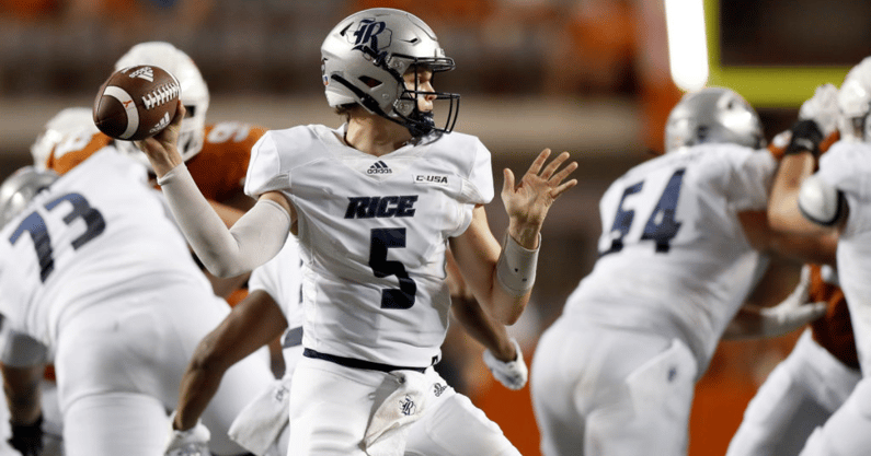 AUSTIN, TEXAS - SEPTEMBER 18: Wiley Green #5 of the Rice Owls looks to pass in the first half against the Texas Longhorns at Darrell K Royal-Texas Memorial Stadium on September 18, 2021 in Austin, Texas. 