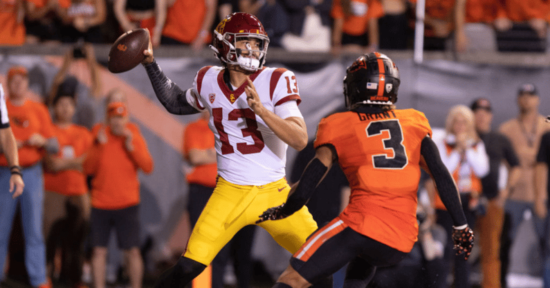 USC quarterback Caleb Williams (13) throws the ball as Oregon State defensive back Jaydon Grant (3) pressures him during the college football game between the USC Trojans and the Oregon State Beavers on September 24, 2022 at Reser Stadium in Corvallis, Or