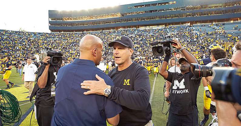 Michigan coach Jim Harbaugh with James Franklin