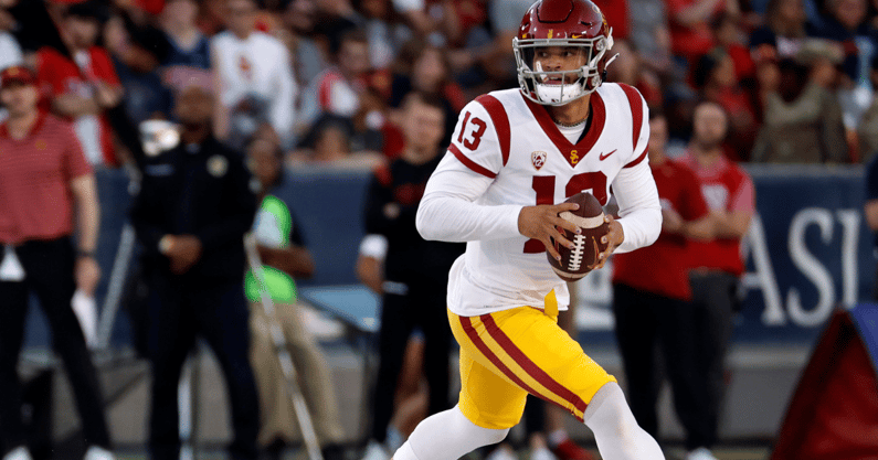 Quarterback Caleb Williams #13 of the USC Trojans runs during the first half against the Arizona Wildcats at Arizona Stadium on October 29, 2022 in Tucson, Arizona. (Photo by Chris Coduto/Getty Images)