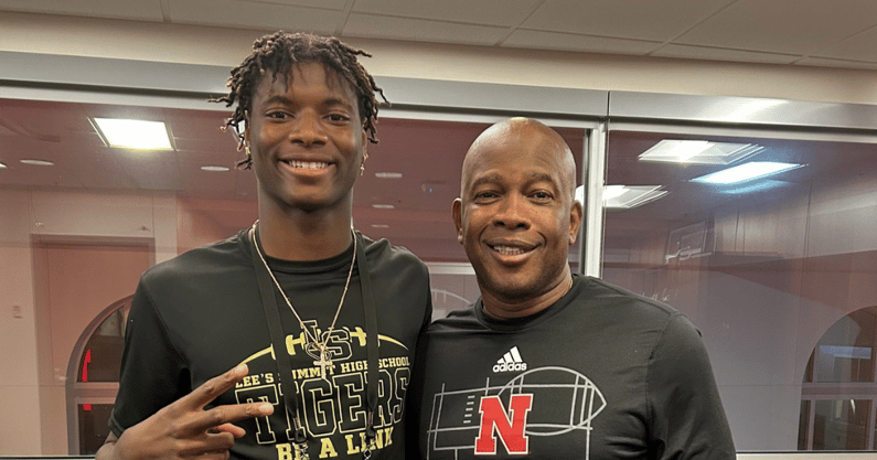 David Dossett and Nebraska head coach Mickey Joseph